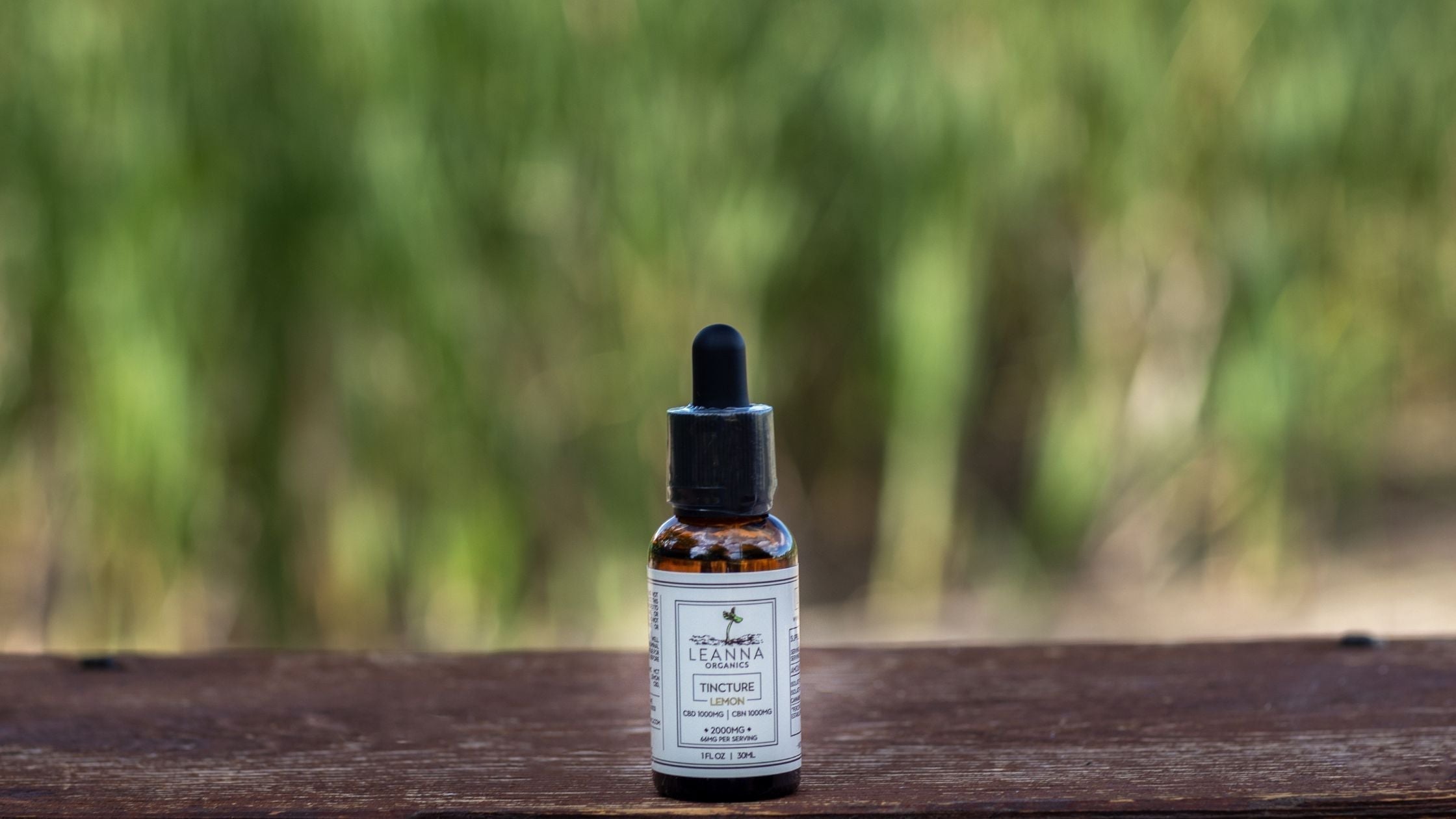 Leanna Organics CBD oil with a natural background