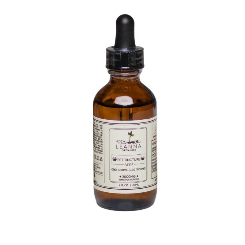 An amber glass dropper bottle of Leanna Organics Pet Tincture Beef tincture, 2 fl oz, on a white background.